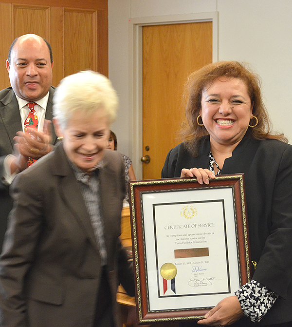 Former Chair Betty Reinbeck presents Virginia Hermosa an award