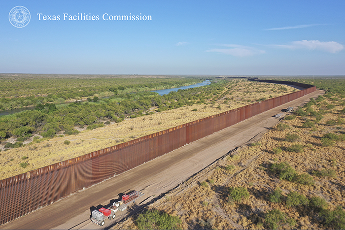 border wall section along Rio Grande